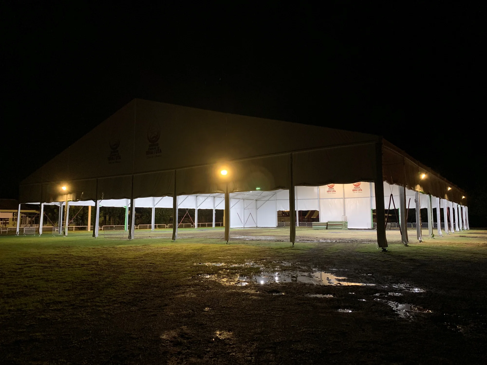 Large FPAOM POLYNÉSIE structure illuminated at night in Teva i Uta